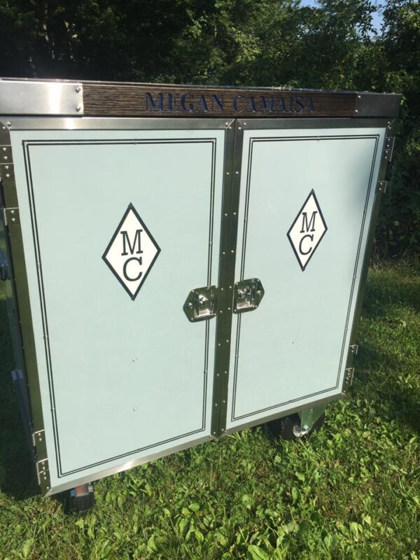 Megan Camasa's light blue mobile bar.