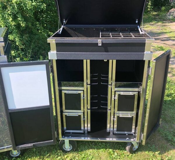 Black mobile cart with storage compartments.