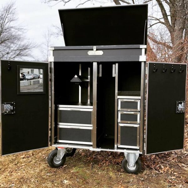 Black mobile tack trunk, open.
