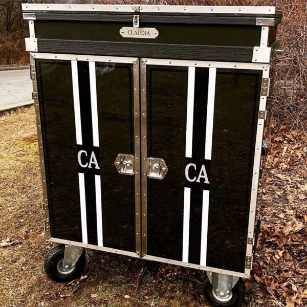 Black rolling cabinet with CA initials.