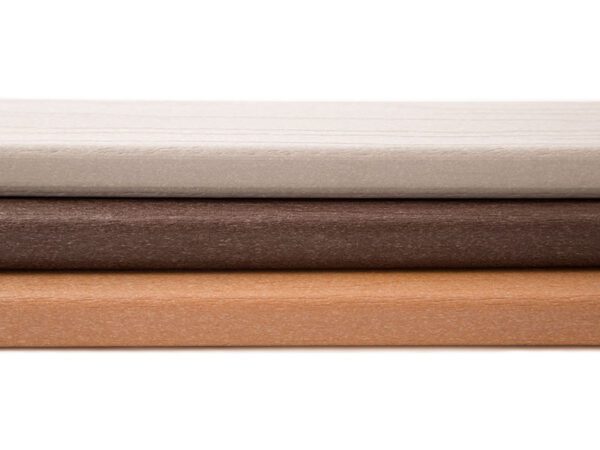 Three composite decking samples, stacked.