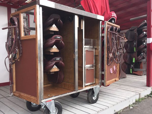 Wooden saddle and bridle cart.