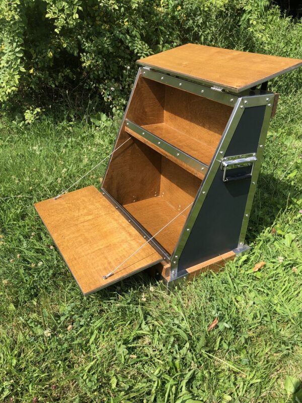 Open wooden storage cabinet with shelves.