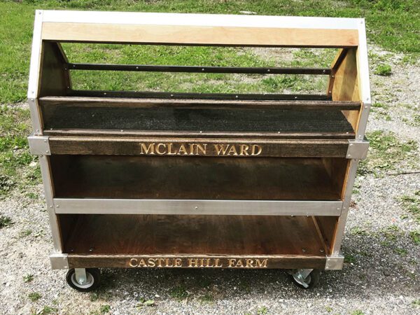 Here's an alt tag for the image: Castle Hill Farm's wooden cart.
